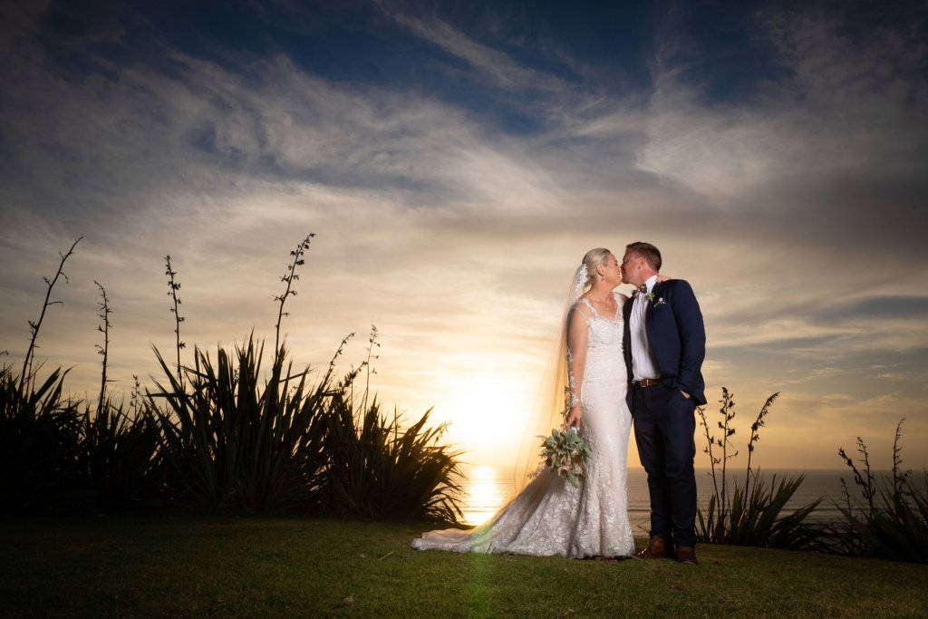 Real Bride Jamielle wearing her Custom Harriett Falvey Wedding Dress and Veil Made in New Zealand